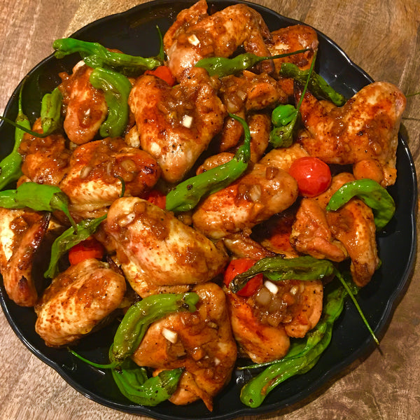 Grilled Chicken Wings with Tomatoes and Shishito Peppers